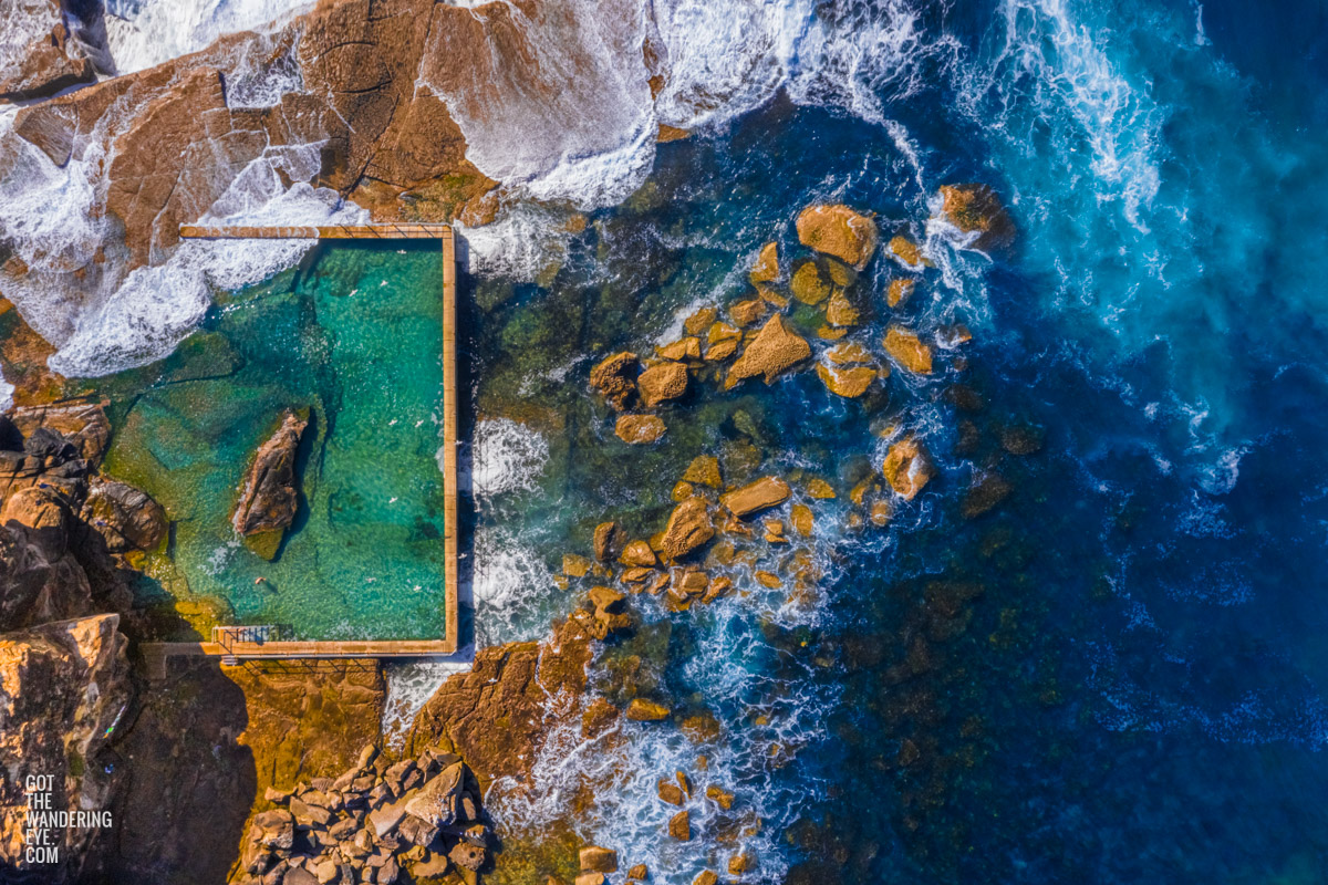 Birds eye aerial view above one of Sydney's best rockpools, North Curl Curl Pool.