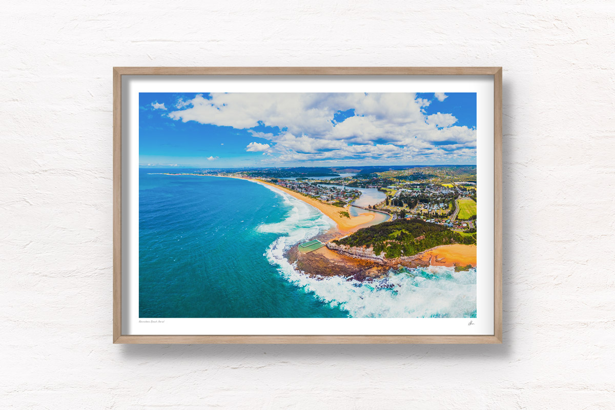 Aerial above North Narrabeen Beach rock ocean pool looking back to Manly. Framed art photography wall art print by Allan Chan.