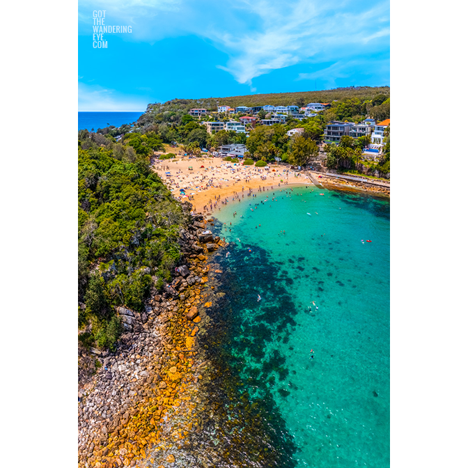 Aerial photo above Shelly Beach of swimmers enjoying a summers day in Manly.