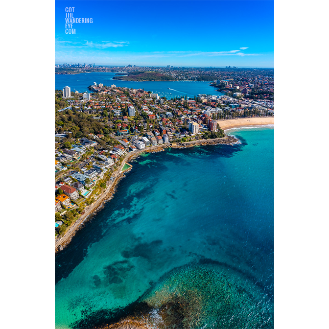Cabbage Tree Bay Aquatic Reserve aerial photography. Aerial view looking back towards the Sydney City CBD skyline on a sunny clear day.