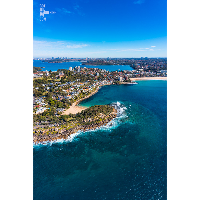 Manly Aquatic Aerial above Cabbage Tree Bay Aquatic Reserve looking back towards the Sydney City skyline on a sunny clear day.