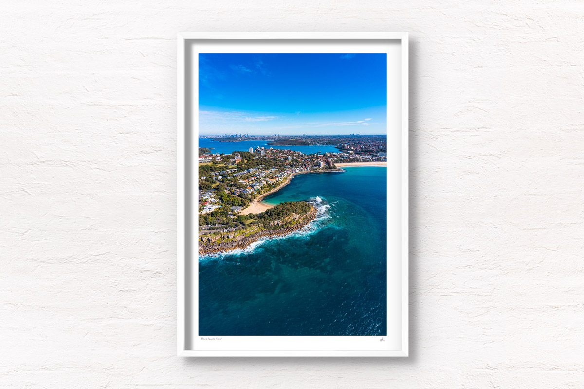 Manly Aquatic Aerial above Cabbage Tree Bay Aquatic Reserve looking back towards the Sydney City skyline on a sunny clear day. Framed art photography, wall art prints by Allan Chan.