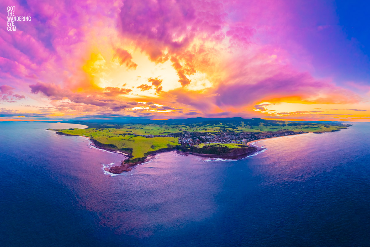 Sublime South Coast Sunset. Aerial view above Gerringong headlands looking back towards the mountains during a spectacular sunset.
