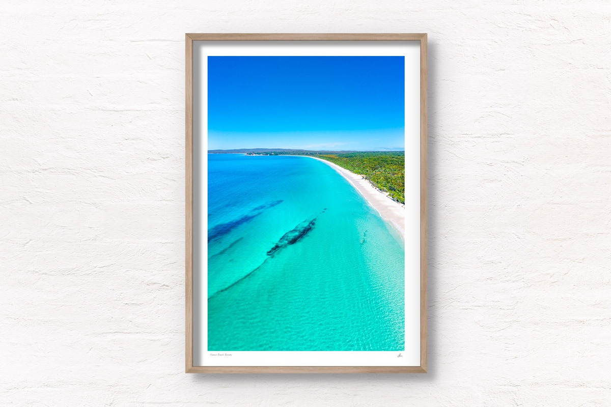 Hyams Beach Beauty. Aerial view above crystal clear, turquoise waters of Jervis Bays finest beach. Framed art photography, wall art prints by Allan Chan.