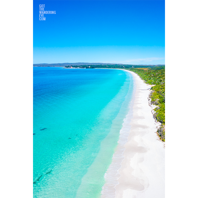 Hyams Beach Bliss. Aerial view above crystal clear, turquoise waters of NSW South Coast's whitest sand beach.