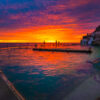 Bronte Rock Pool Sunrise. Fiery sunrise at Sydney's Iconic Bronte Oceanpool.