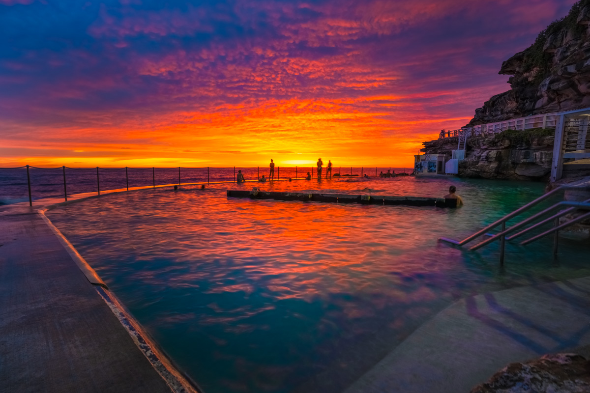 Bronte Rock Pool Sunrise. Fiery sunrise at Sydney's Iconic Bronte Oceanpool.