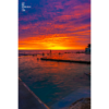 Bronte Beach Oceanpool Sunrise. Red Flames on the horizon at Sydney's iconic swimming pool.